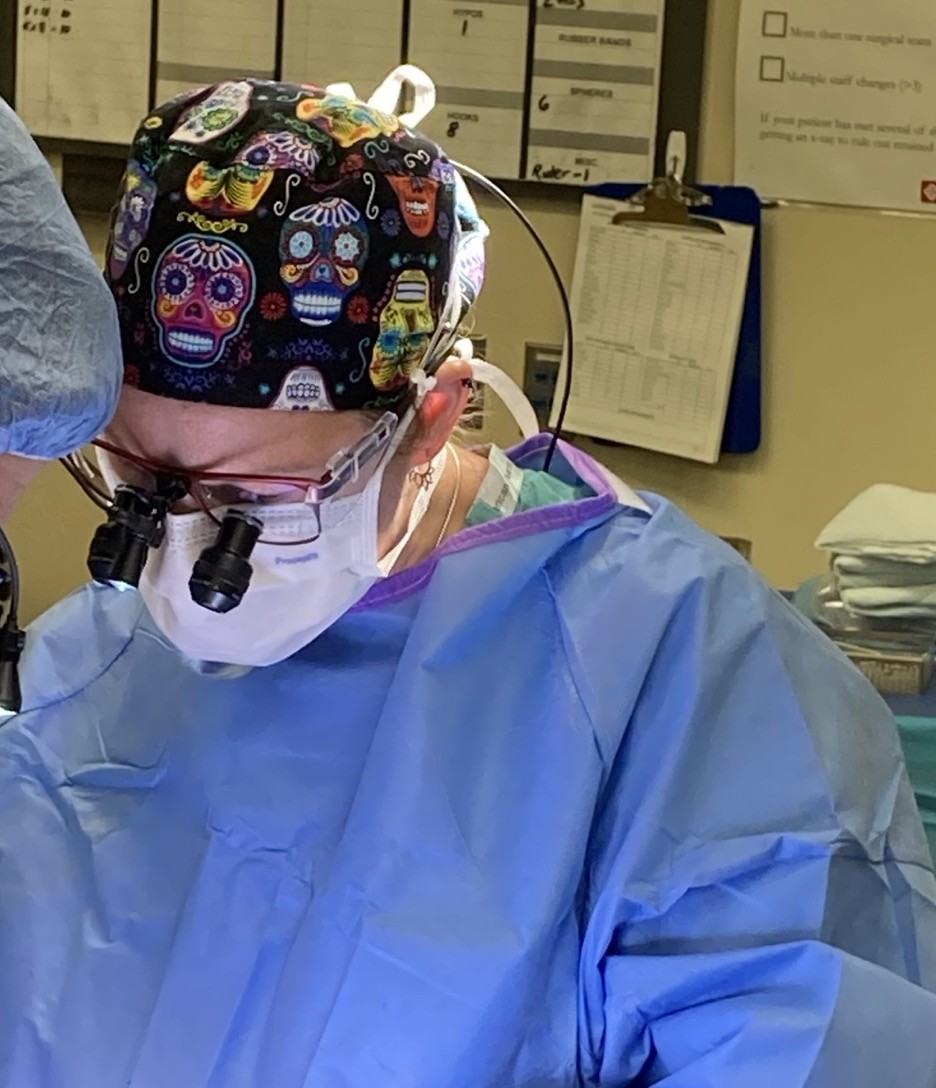 Dr. Hogan concentrating during a surgical procedure